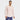 A man smiles while standing against a plain white background, wearing the All in Motion Men's Waffle-Knit Henley Athletic Top in pink.