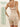 A model wears beige ATOG Women’s High-Waisted Tummy Control Shapewear Shorts, with callouts detailing the silicone bones, elastic waistband, and ventilated crotch of these thigh-smoothing shorts.