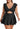 A woman models the B2prity Women’s Plus Size Cutout Tummy Control Swim Dress in black by B2prity. The modest one piece swimsuit features a deep V-neck, ruffled sleeves, a cutout below the bust, and a flared skirt for elegant coverage and flattering style. She is standing against a white background.