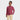 A smiling boy wearing a Cat & Jack Boys’ Long Sleeve Washed Solid T-Shirt in burgundy, featuring a chest pocket, and light beige pants stands against a plain white background.