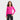 A girl with shoulder-length brown hair wears the Art Class™ Girls’ Long Sleeve V-Neck Cinch T-Shirt in vibrant pink, featuring a subtle ribbed texture, along with black cargo pants. She stands smiling with one hand on her hip against a plain white background.