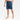 A person stands barefoot in Men's 9" Knit Pajama Shorts - Goodfellow & Co™ Dark Teal Blue, hands relaxed at their sides, against a plain white background.