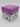 A Fidge Box Set - Squishy Bracelet by Bullseye’s Playground, featuring a purple lid and images of the 8 different included toys—such as Squishy Bracelet and Fidget Pencil Topper—on the sides, rests on a white surface.