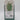 A Fresh Herb Storage Container - Large Green from Bullseye’s Playground™, made of clear and green plastic, features herb illustrations and usage instructions on the front label; priced at $5. These details help categorize the product easily in your kitchen or store.