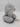 A mannequin displays the Bullseye’s Playground Hooded Travel Pillow, in light gray, featuring an attached hood for comfort and privacy during travel. This ergonomic neck support pillow by Bullseye’s Playground includes a small tag visible next to the pillow.