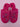 A pair of Women’s Holiday Oh What Fun! Scuff Slippers by Wondershop, featuring a fuzzy bright pink design and colorful embroidered text on top, photographed against a plain white background.