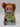 The Disney Frozen II Young Anna Doll features vibrant red hair styled in pigtails and a charming green dress, presented in packaging with Anna’s image and the Frozen II logo—a delightful adventure toy perfect for fans of all ages.