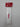 A packaged Wilson Performance Headband in white, One Size Fits All (OSFA), is shown on a white background. The athletic headband features the bold red Wilson logo and comes in clear plastic packaging with a red top label displaying “W HEADBAND.” Designed by Wilson, it offers both style and moisture-wicking comfort for your active lifestyle.