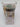 A 2.5 oz (70.9 g) Wondershop Gel LED Christmas Tree Winter Carnivale Scented Candle, featuring a glass container adorned with gold stars and red dots, blue gel wax in the center, and a festive label displaying a Christmas tree candle—perfect for adding holiday décor to your space.