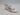 Black The Drop Women’s Sophia Wedge Sandals with a square-toe, two thin straps over the foot, and a beige footbed.