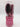 A Professional Quality 5-Piece Hair Brush Styling Set – Pink featuring a paddle brush, roller brush, mirror, cylinder, and hair clip inside a clear cylindrical display case.