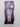 A tube of L.A. COLORS Beautifully Bewitched Glitter Face & Body Gel – Starlit, featuring iridescent glitter in purple celestial-themed packaging.