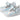 Pair of shiny, iridescent Stride Rite SM Lucianne Girls’ Infant/Toddler Leather Shoes with buckle straps, white soles, and perforated details, displayed facing left. These Stride Rite shoes are thoughtfully designed to keep little feet comfortable.