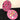 Taste Beauty Hello Kitty Halloween 9-Color Eyeshadow Palette in a round shape featuring Hello Kitty in a black dress against a pink and purple town silhouette.