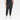 A person wearing All In Motion Women's Active Light Mid-Rise Cargo Joggers in black, paired with a navy top and white sneakers, stands with one hand in a pocket against a plain white background.