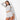 A woman poses confidently in a Wild Fable Women's Hooded Sweater Shrug in Heather Gray with shoulder cutouts and matching high-waisted shorts, standing against a white background with her hood up and one hand on her head.