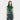 A woman with long dark hair wears the Women's Ruched Tank Top by A New Day™ in green, paired with matching pants, standing against a plain white background.