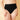 A person stands against a beige textured wall, wearing Shade & Shore Women's Shirred High Waist Full Coverage Bikini Bottom in black, featuring ruched sides and a chic, full-coverage pull-on design.