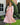 A woman wears a hat, sunglasses, and a beige Zesica Women’s Smocked Tiered Long Sleeve Midi Dress M, featuring long sleeves and a tiered skirt.